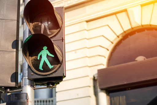 Traffic light with a walking signal.