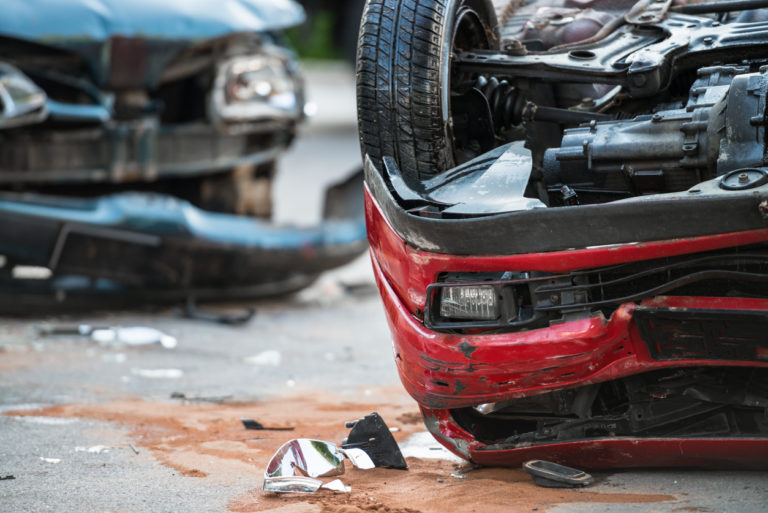 Firefighters At A Car Accident Scene