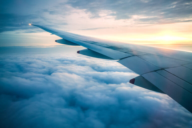 View of Airplane's Wings on Sunset