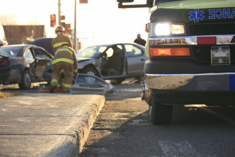 Car accident scene with ambulance.