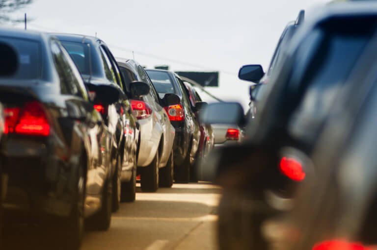 Lines of cars stuck in a traffic jam.