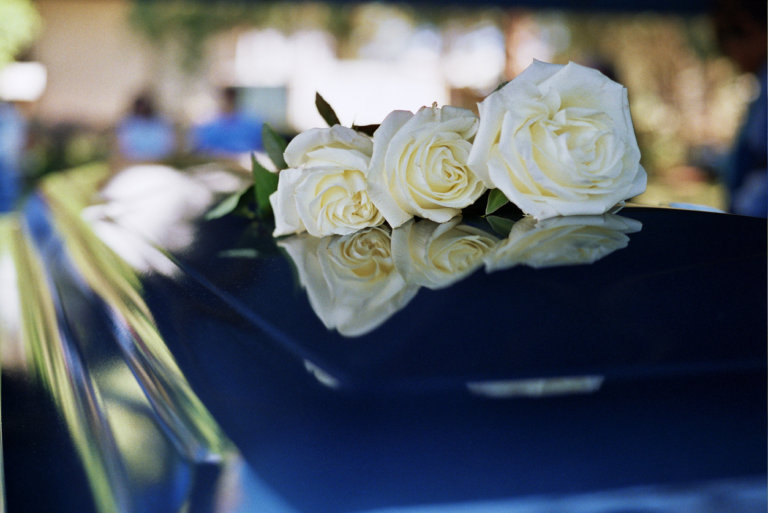 flowers on top of a grave