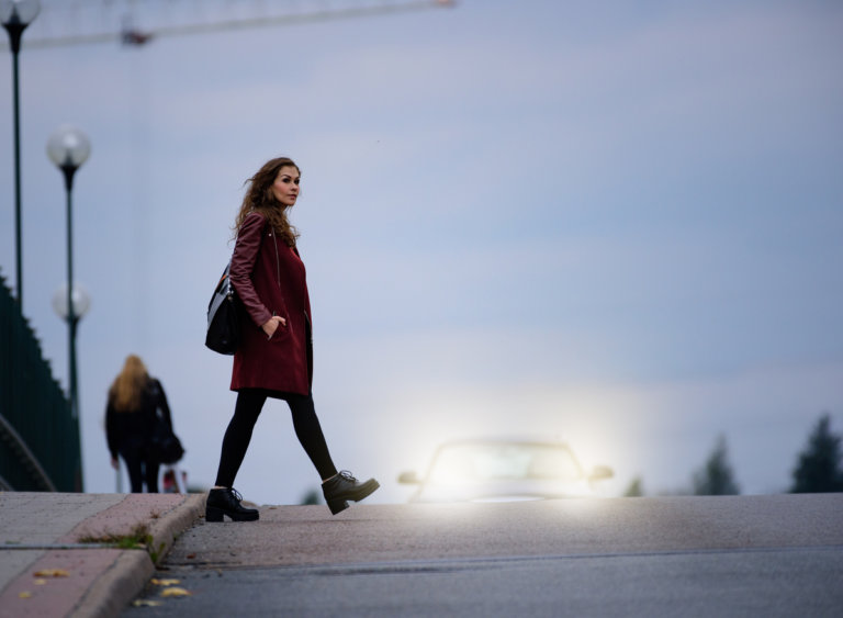 pedestrian walking at night