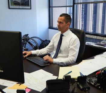 Jason working at his desk