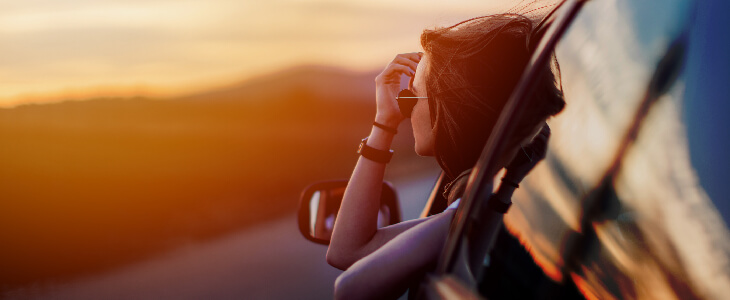 woman hanging out car window with sunglasses drunk driving accidents