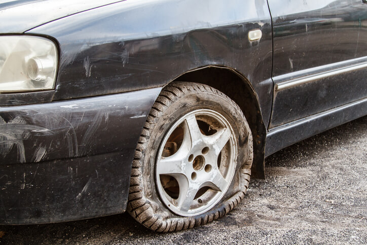 Car with deflated tire