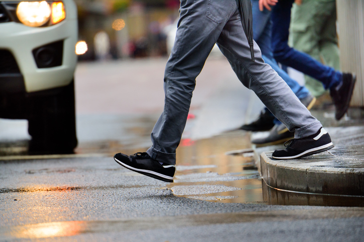 Person walking into the street