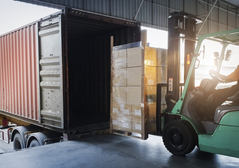 workers loading commercial truck