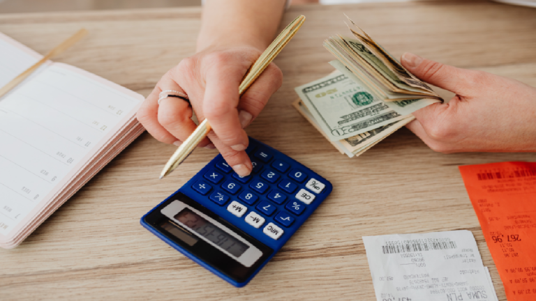 Woman calculating her earnings