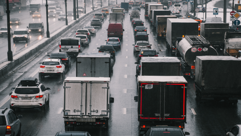 trucks on a highway with roads