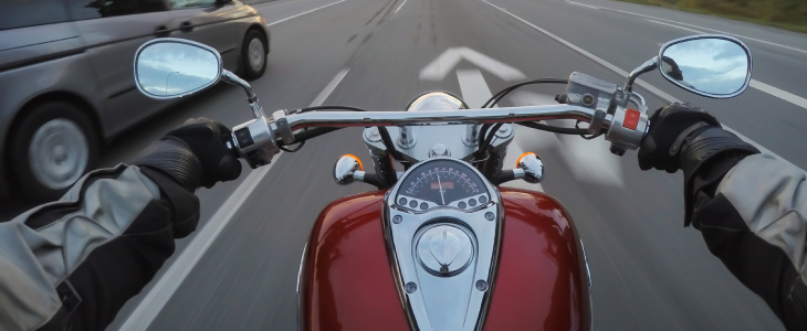 Man driving motorcycle on a highway