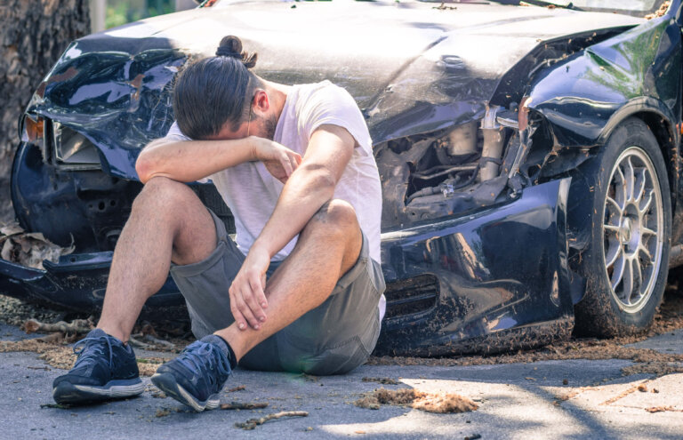 Man after a car accident in emotional distress