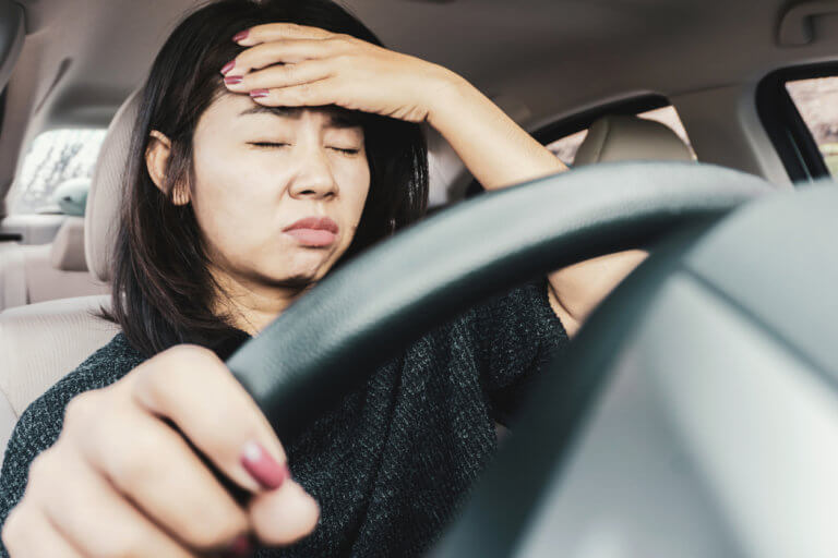 woman with headache after an accident