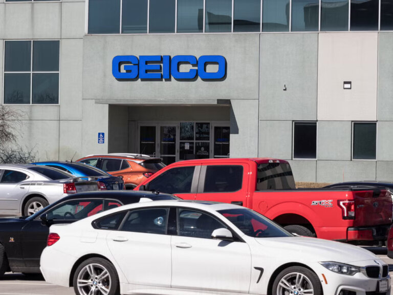 Cars in parking lot of geico insurance