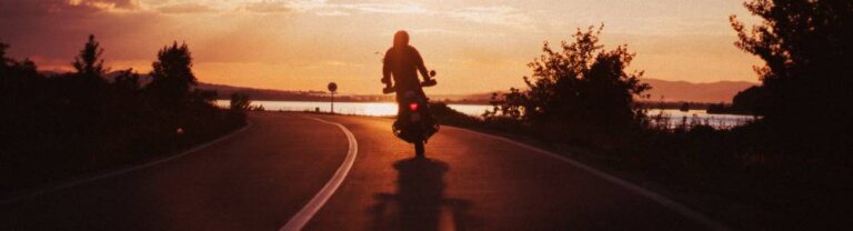 motorcycle rider at sunset