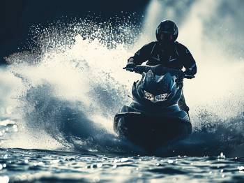 a jet ski being ridden on the water