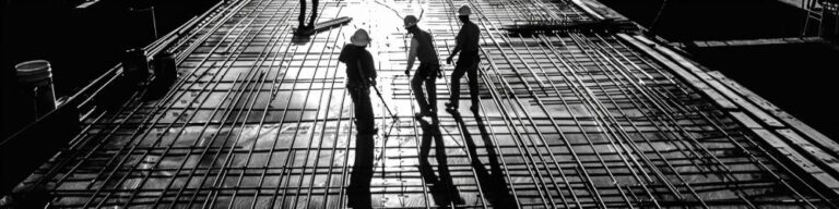 silhouette of construction workers at work