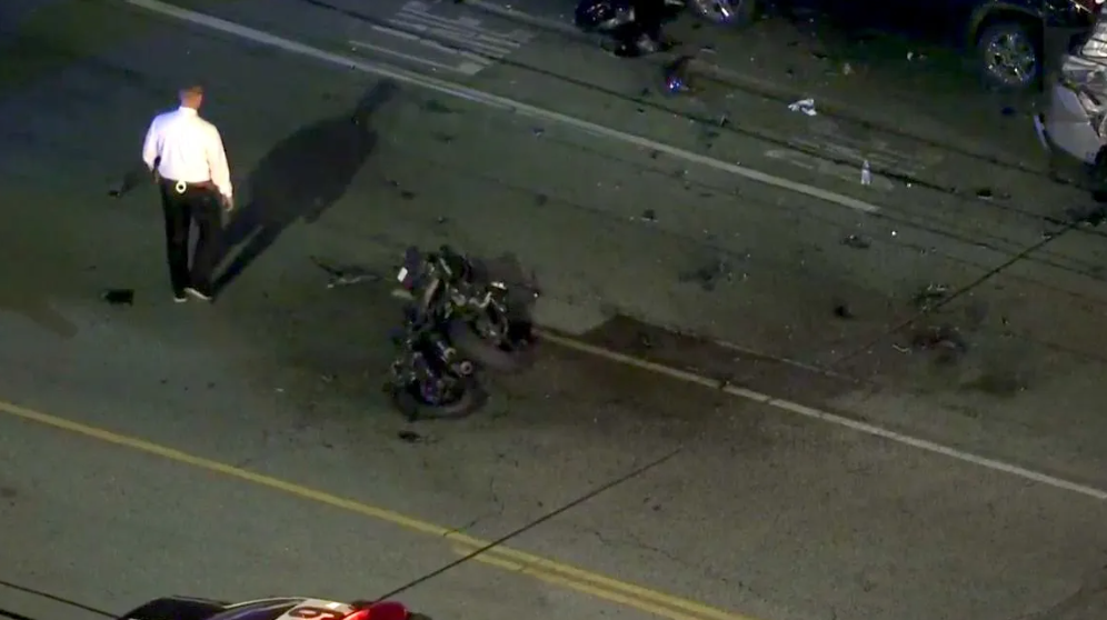 A violent crash in the San Fernando Valley claimed the life of one of two people on a motorcycle and critically injured the other