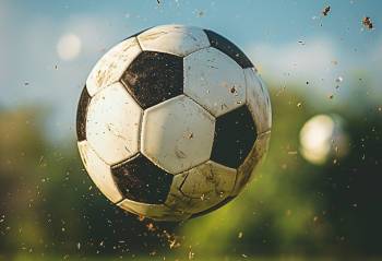 a soccer ball flying through the air